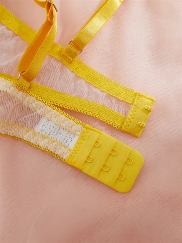 Komplet bielizny push-up z żółtym haftem kwiatowym i motywem stokrotek